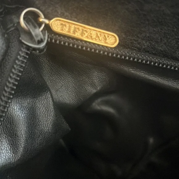 Tiffany and Co. leather handbag in good condition. Gold hardware Zipper closure